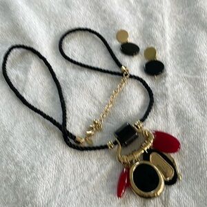 Necklace black rope with black burgundy charms